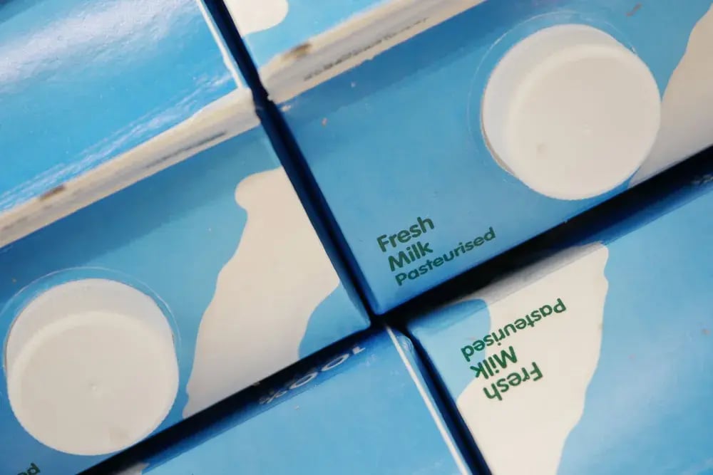 Close-up of fresh milk cartons