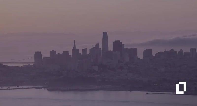 California SB 253 climate disclosure rules: San Francisco skyline across the bay at dusk