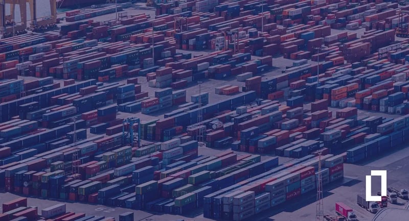 Aerial view of container stacks at the Port of Barcelona, illustrating EU climate disclosure rules and supply-chain Scope 3 data