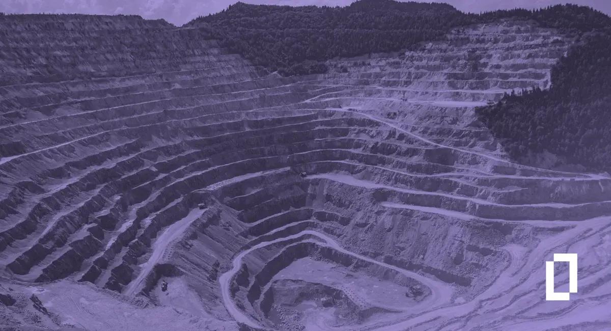 Mining and manufacturing emissions examples: terraced benches and haul roads in an open-pit mine
