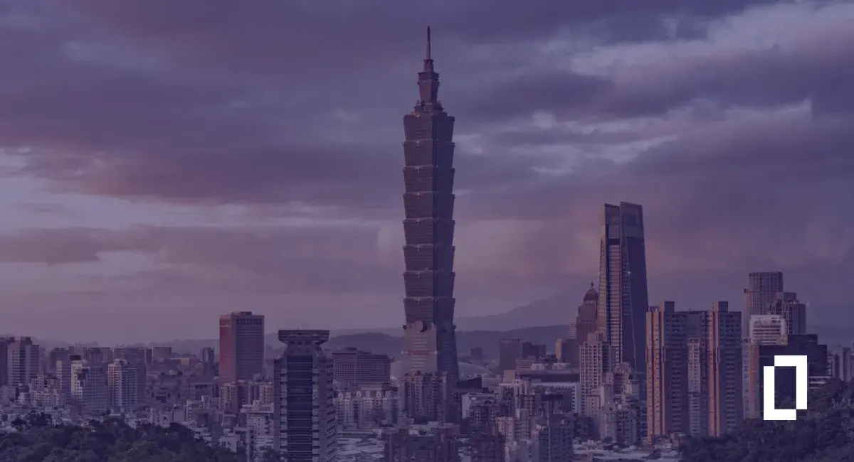 Taiwan climate disclosure rules: Taipei 101 and the Taipei city skyline at sunset